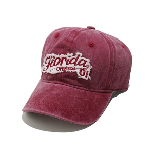 Close-up of vintage burgundy washed cotton baseball cap with Florida embroidery