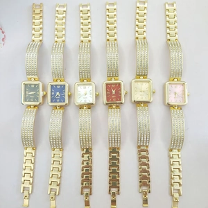 Detailed flat lay of luxury square quartz watches with diamond straps in six vibrant colors
