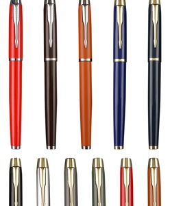 Detail of multi-color metal rollerball pens showing polished caps and arrow clips