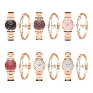 Women's steel watch and star bracelet set available in multiple elegant metallic colors