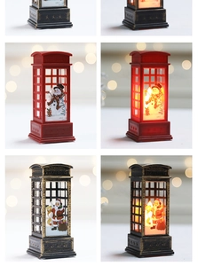 Detail of light-up LED telephone booth lanterns with Santa and Snowman holiday figures