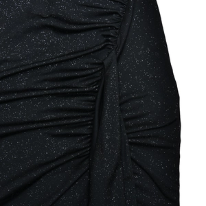 Detail showing black ruched fabric with shimmering sequins on a sleek fishtail dress