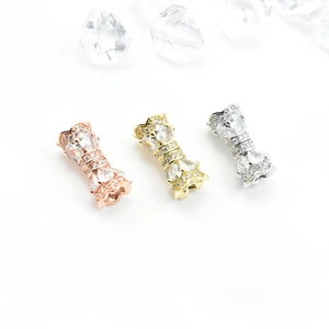 Bow-shaped zircon screw clasp for necklaces in rose gold, gold and silver finishes