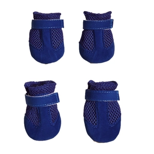 Detail of blue mesh dog sandals showing breathable fabric and secure velcro strap