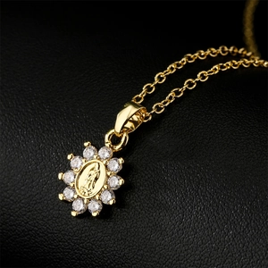 Exquisite gold sunburst Virgin Mary pendant necklace with sparkling cubic zirconia accents