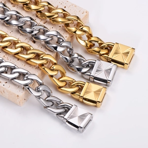 Classic Cuban link chain bracelets in gold and silver stainless steel with sunburst clasp
