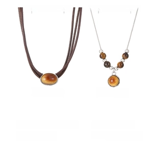 Macro detail of tiger eye stone necklaces in woven cord and silver chain styles