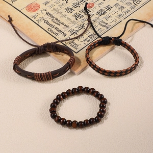 Three-piece set of woven leather and wood bead bracelets with a vintage punk design