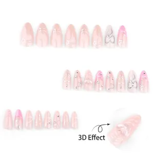 Pink French press-on nails with 3D heart, stars, and almond shape for Valentine's day
