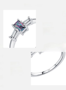 Macro detail of S925 sterling silver ring showing colorful zircon and S925 hallmark