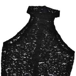 Close-up of black lace high-neck collar with detailed texture and back zipper closure