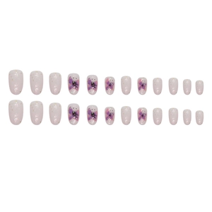 Glittery purple butterfly press-on nails set in oval shape with pink gradient and sparkles
