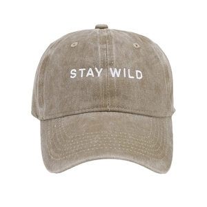 Vintage washed khaki baseball cap with white STAY WILD embroidery for outdoor wear