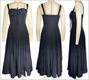 Three-way view of a black midi slip dress with pleated neckline on a mannequin