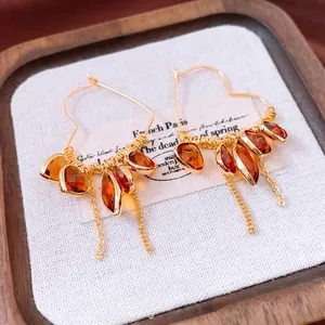 18K gold plated heart hoop earrings with amber glass stones and delicate tassels