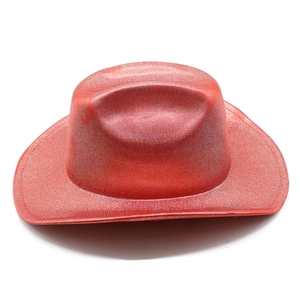 Detailed view of red glitter cowboy hat with metallic finish and wide brim for parties
