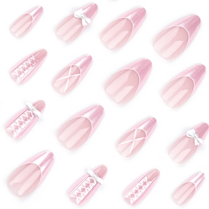 Pink French almond press-on nails with 3D bows, pearl finish, and ribbon patterns