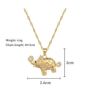 Detail of gold elephant pendant with dimensions 2.6x2cm and chain weight 4.6g