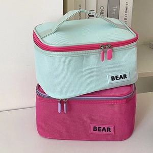 Dual-layer mesh cosmetic bags in mint green and rose pink with BEAR patch and fabric handles