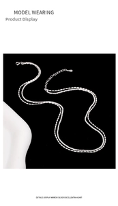 Detailed view of silver double-layer necklace with beaded and twisted rope chain styles