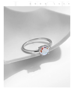 Detailed view of the S925 sterling silver ring with a sparkling iridescent round zircon