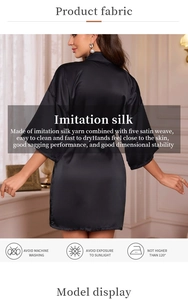 Detail of black imitation silk robe featuring five satin weave for a smooth drape texture