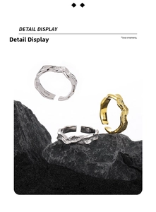 Detail view of S925 sterling silver open rings with wave texture and matte finish