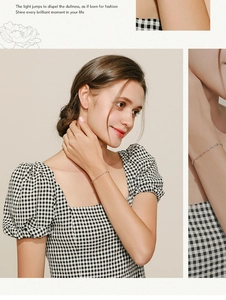Detail of 925 sterling silver bracelet with colorful beads shown on model's wrist