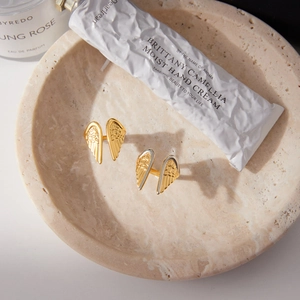 Elegant wing-shaped adjustable stainless steel rings in two-tone gold and silver finish