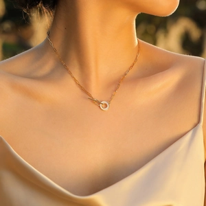 Women's gold stainless steel box chain necklace with shell ring OT buckle on model