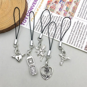 Set of five vintage silver alloy charms featuring moon, heart, and fairy on black cords