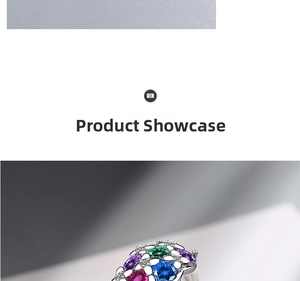 Close-up of multicolor floral gemstone ring with marquise cut stones in silver setting