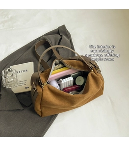 Spacious brown suede baguette bag showing large interior capacity for daily essentials
