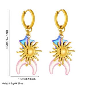 Gold celestial earrings with colorful star moon and sun pendants on round hoops