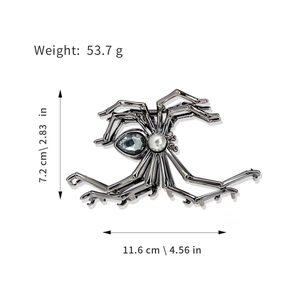 Detailed size specifications for a spider-shaped metal hair claw with gemstone and pearl