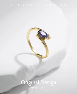 Detailed close-up of S925 sterling silver gold ring with purple oval gemstone