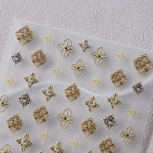 Japanese embossed nail art stickers with metallic champagne gold and silver floral designs