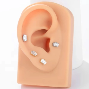 Set of four crown G23 titanium labret studs in gold and silver finish with sparkling zircons