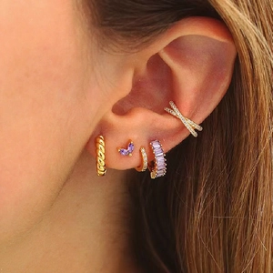 925 silver earrings set with purple square zircon and gold twist hoops on model