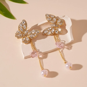 Elegant gold butterfly tassel earrings with pink flowers and sparkling rhinestones