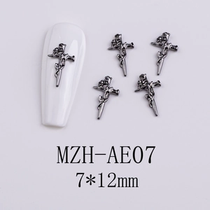 Macro detail of gunmetal cross and rose nail charms with dimensions 7x12mm