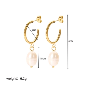 Detailed view of french pearl earrings with dimensions 4cm length and gold hoop hooks
