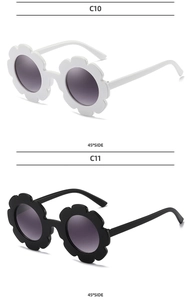 Detail view of flower-shaped kids sunglasses in white and black with side profile view