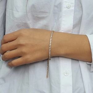 Elegant 18k gold plated Cuban chain bracelet with sparkling cubic zirconia on a wrist