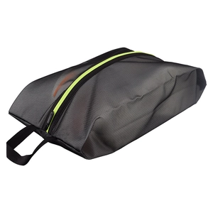 Breathable black mesh shoe bag with neon yellow zipper and handle for travel storage