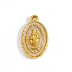 Oval gold-plated religious pendant with Virgin Mary relief and beaded edge detail