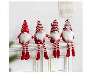 Detail view of long-legged Christmas gnomes featuring knitted hats and plush textures