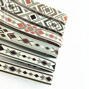 Detailed view of bohemian style woven bag straps with geometric patterns and vintage colors