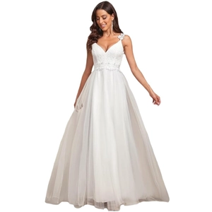 Elegant white A-line wedding dress featuring a deep V-neckline and intricate lace appliques