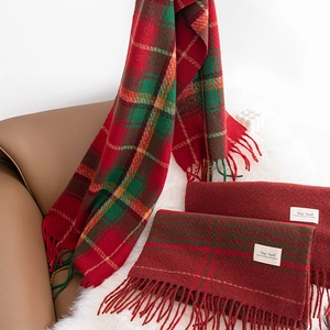 Classic red and green plaid scarf with tassels made of soft cashmere-like fabric